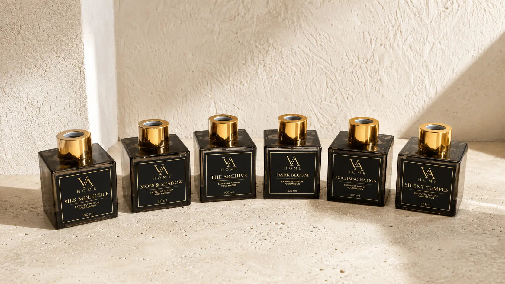 Шість ароматів Noir Collection VA HOME у світлому просторі з каменем і м’яким ранковим світлом